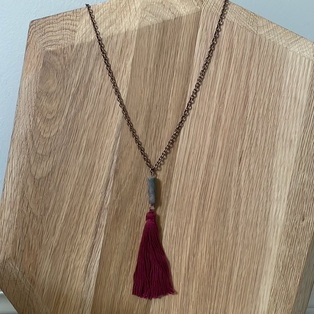 Burgundy tassel necklace with grey and mauve stone